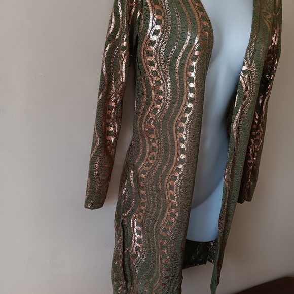 New With Tags. Green with Copper shimmer design sheer cardigan. Women's size M. - Picture 2 of 4